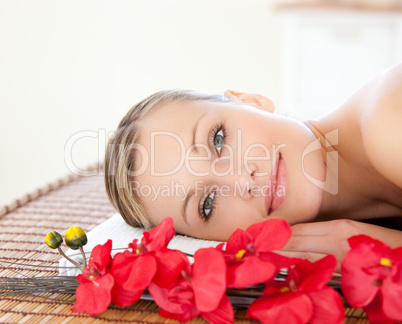 Radiant woman relaxing in a Spa center
