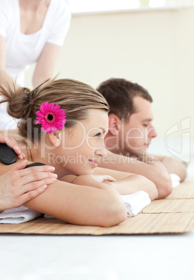 Smiling young couple enjoying a Spa treatment