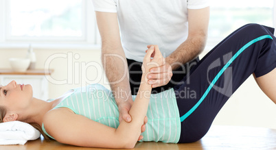 Attractive young woman receiving a massage