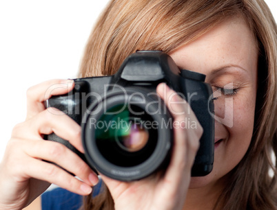 Beautiful woman using a camera