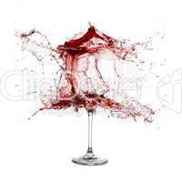 Explosion of a glass with red wine