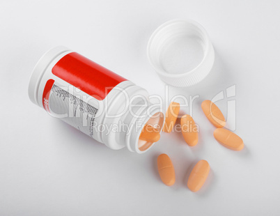 Pot of yellow tablets