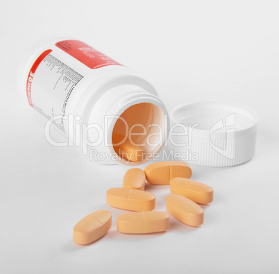 Pot of yellow tablets