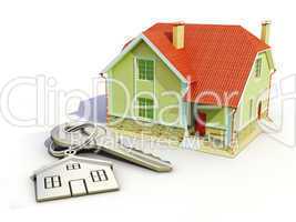 House and house keys on white background