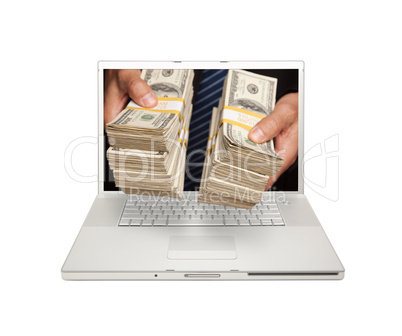 Man Handing Stacks of Money Through Laptop Screen