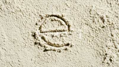 The alphabet is written then erased in sand
