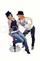 Two ladies with hats on a white background