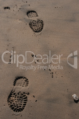 Fußabdruck im nassen Sand