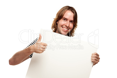 Smiling Young Man with Thumbs Up Holding Blank White Sign