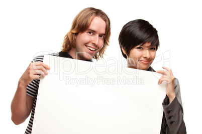 Attractive Diverse Couple Holding Blank White Sign