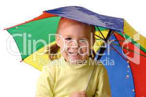 Cute child catching raindrops under umbrella