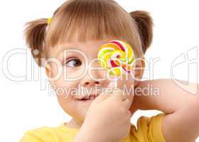 Little girl with lollipop