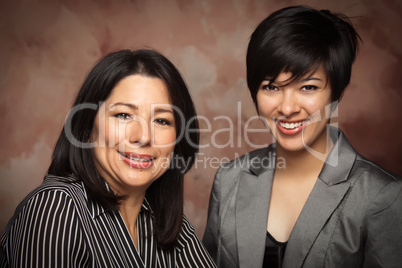 Attractive Multiethnic Mother and Daughter Studio Portrait