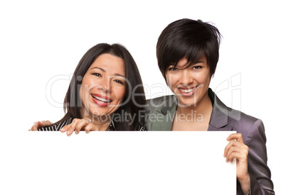 Attractive Multiethnic Mother and Daughter Holding Blank White S
