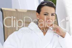 Beautiful Hispanic Woman in White Bathrobe At Health Spa