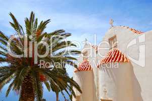 Orthodox Church and palm tree fronds, Crete, Greece