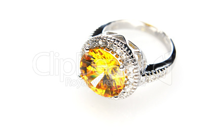 Ring with orange stone