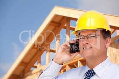 Contractor in Hardhat at Construction Site