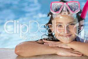 Happy Girl Child In Swimming Pool with Goggles and Snorkel