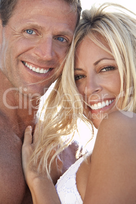 Sexy Attractive Man and Woman Couple Happy At the Beach