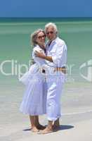 Happy Senior Couple Embracing on A Tropical Beach