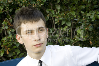 Teenager on park bench