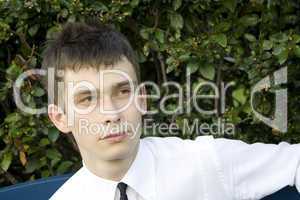 Teenager on park bench