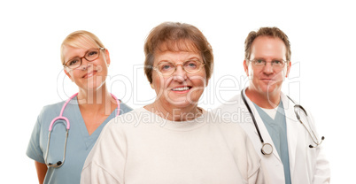 Smiling Senior Woman with Medical Doctor and Nurse Behind