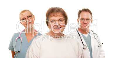 Smiling Senior Woman with Medical Doctor and Nurse Behind