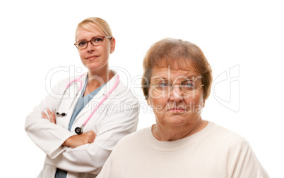 Concerned Senior Woman with Doctor Behind.