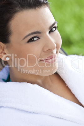 Beautiful Hispanic Woman in White Bathrobe At Health Spa