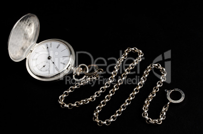Silver pocket watch with chain
