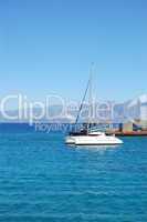 Luxury yacht and turquoise Aegean Sea, Crete, Greece