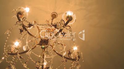 Ceiling crystal chandelier dolly shot