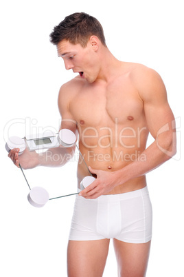 Man with bathroom scales