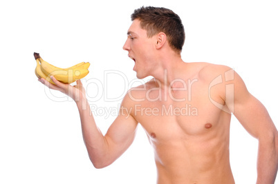 Naked man with fruit