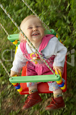 child on swing