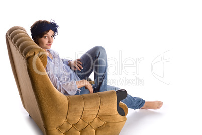 woman sitting in armchair