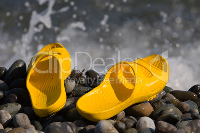 slippers on the beach