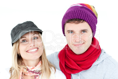 Charming couple looking at the camera together