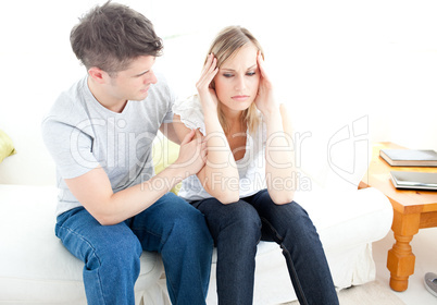 Exhausted couple having an argue together