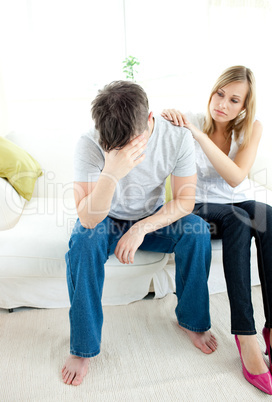 Caucasian couple having an argue in the living-room