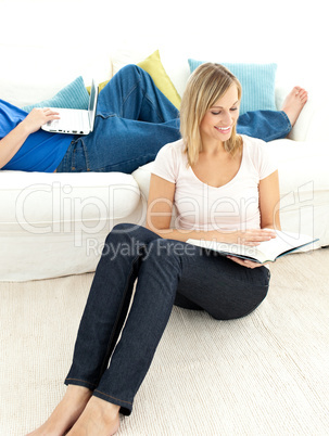 United couple having free time in the living-room