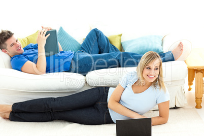 United couple having fun together in the living-room