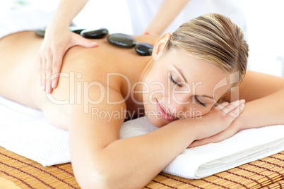 Sleeping woman having a massage