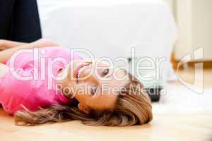 Beautiful woman lying on the floor