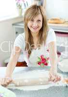 Attractive woman preparing a meal in the kitchen