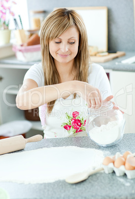 Delighted woman using floor in the kitchen