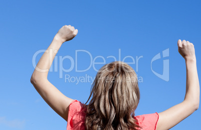 Happy woman punching the air outdoor