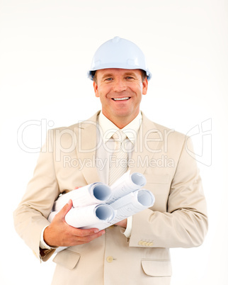 Confident architect holding blueprints